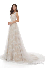 Champagne Tulle Lace Deep V-neck Backless Pearls Wedding Dresses